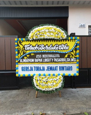 Papan Bunga Duka di Yokari